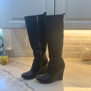 Black leather Tory Burch tall wedge boots. Worn a few times. Clearing out closet